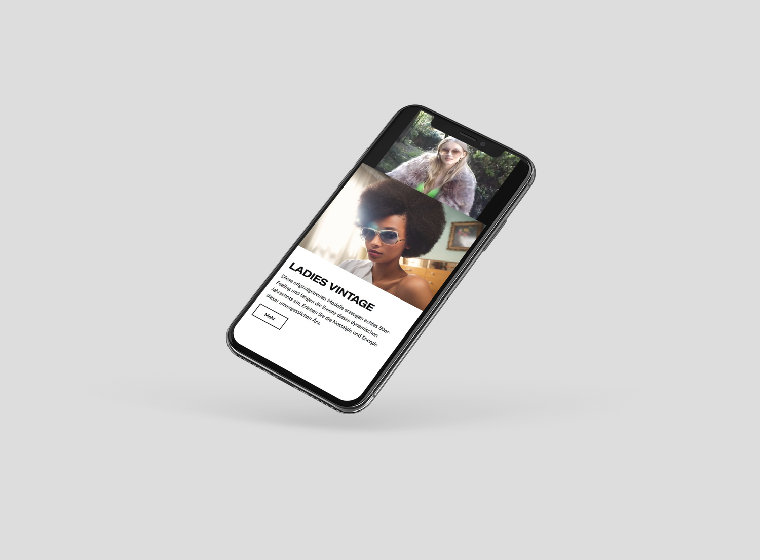 geneigtes Smartphone zeigt Vintage Damenmode Webseite mit Porträts zweier Frauen in Sonnenbrillen
